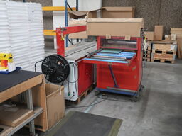 Foil wrapping machine for wrapping mirrors etc.