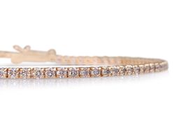 Tennisarmbånd med 94 stk. fancy pink diamanter 1.78 ct.,14 karat guld