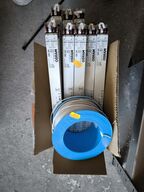 Kasse med LED rør OSRAM og rulle med kabel
