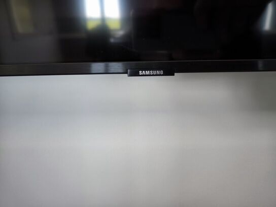 Fjernsyn SAMSUNG UE75TU6905KXXC med fjernbetjening
