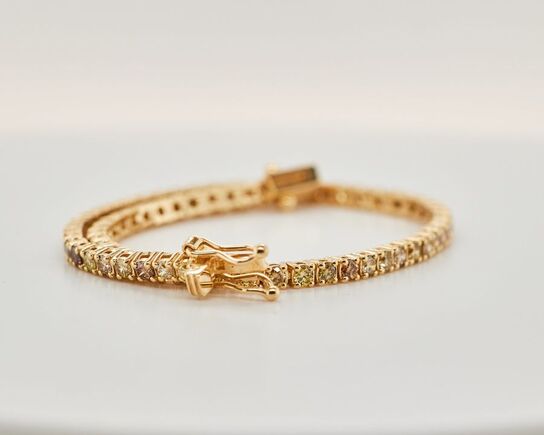 Tennisarmbånd Fancy Intense diamanter 2.55 ct. 14 karat guld