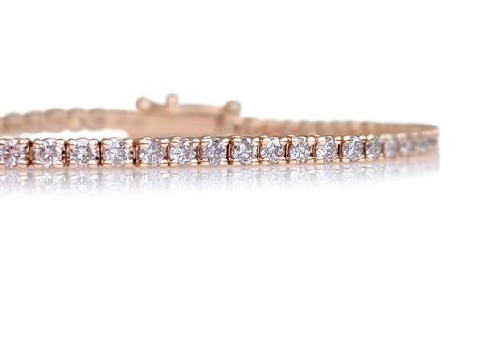 Tennisarmbånd 97 Fancy pink diamanter 1.24 ct. 14 karat guld