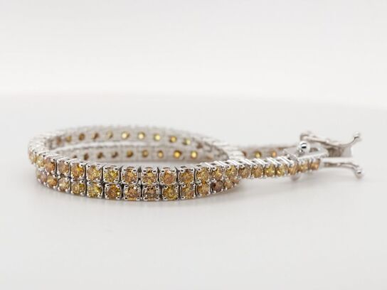 Tennisarmbånd Fancy Intense Yellow / Orange / Brown diamanter 2.90 ct. 14 karat hvidguld