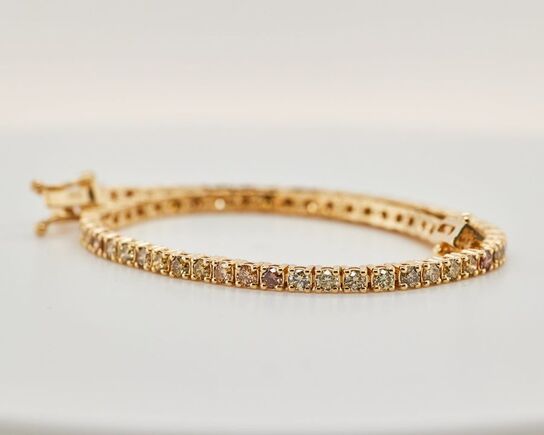 Tennisarmbånd Fancy Intense diamanter 2.55 ct. 14 karat guld