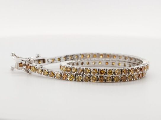 Tennisarmbånd Fancy Intense Yellow / Orange / Brown diamanter 2.90 ct. 14 karat hvidguld