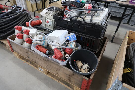 Pallet with power cables, boards and adapters