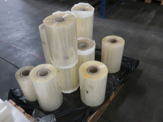 Misc. rolls of tape / plastic with adhesive.