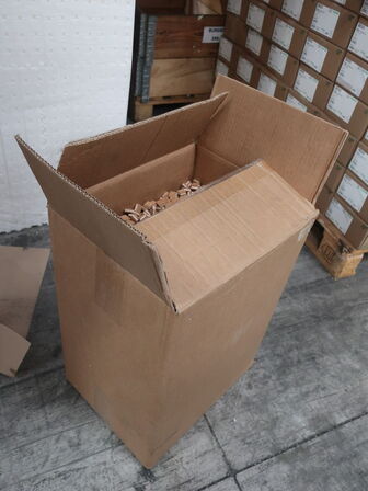 Box with cork blocks to protect fragile objects